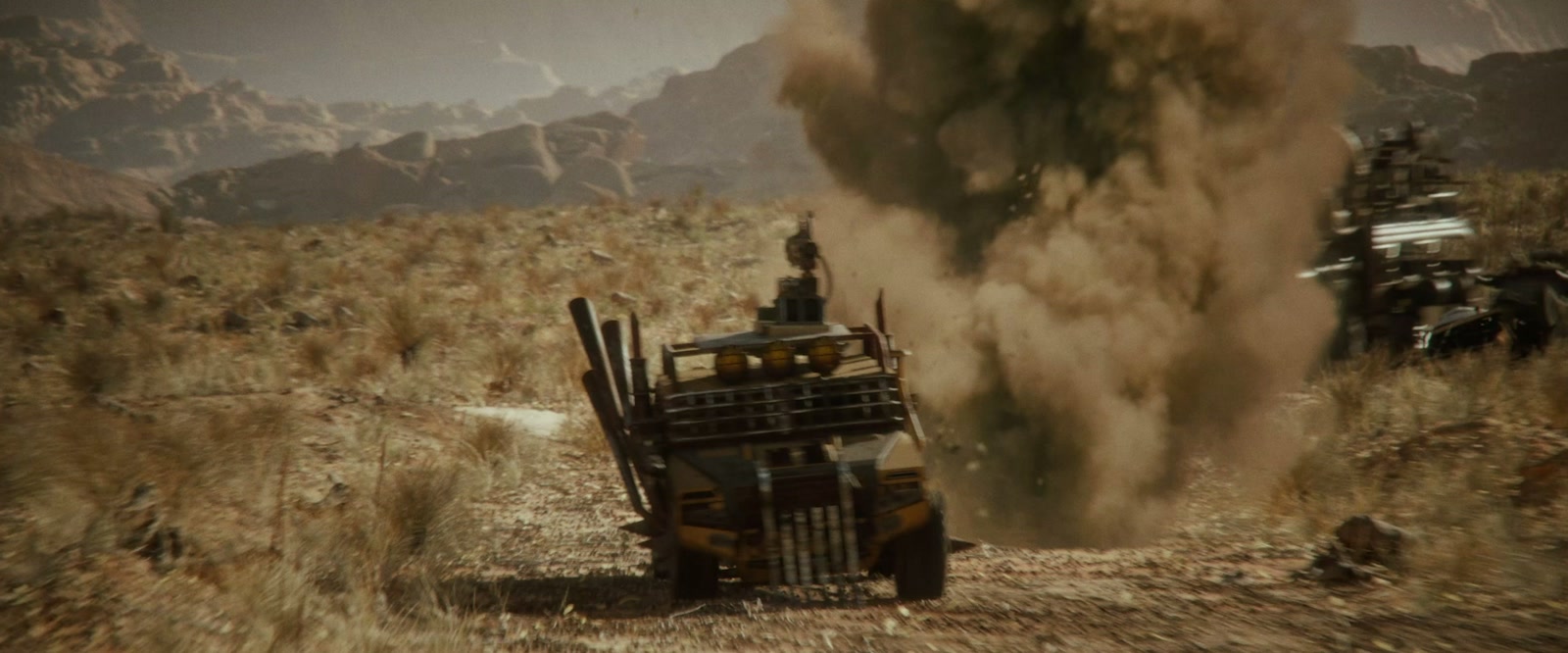 An armored truck racing through desert dust in Rage Fall